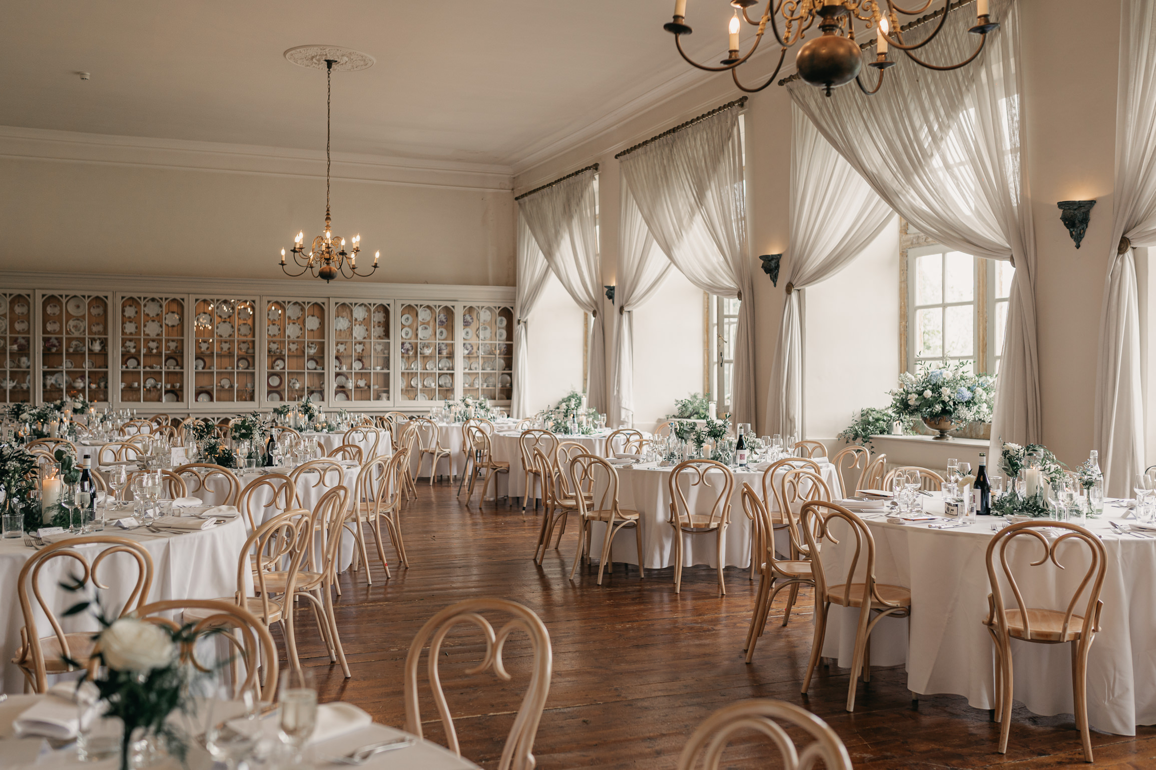 blue floral wedding tables, brympton house ballroom wedding breakfast, somerset wedding venue, manor house wedding venue