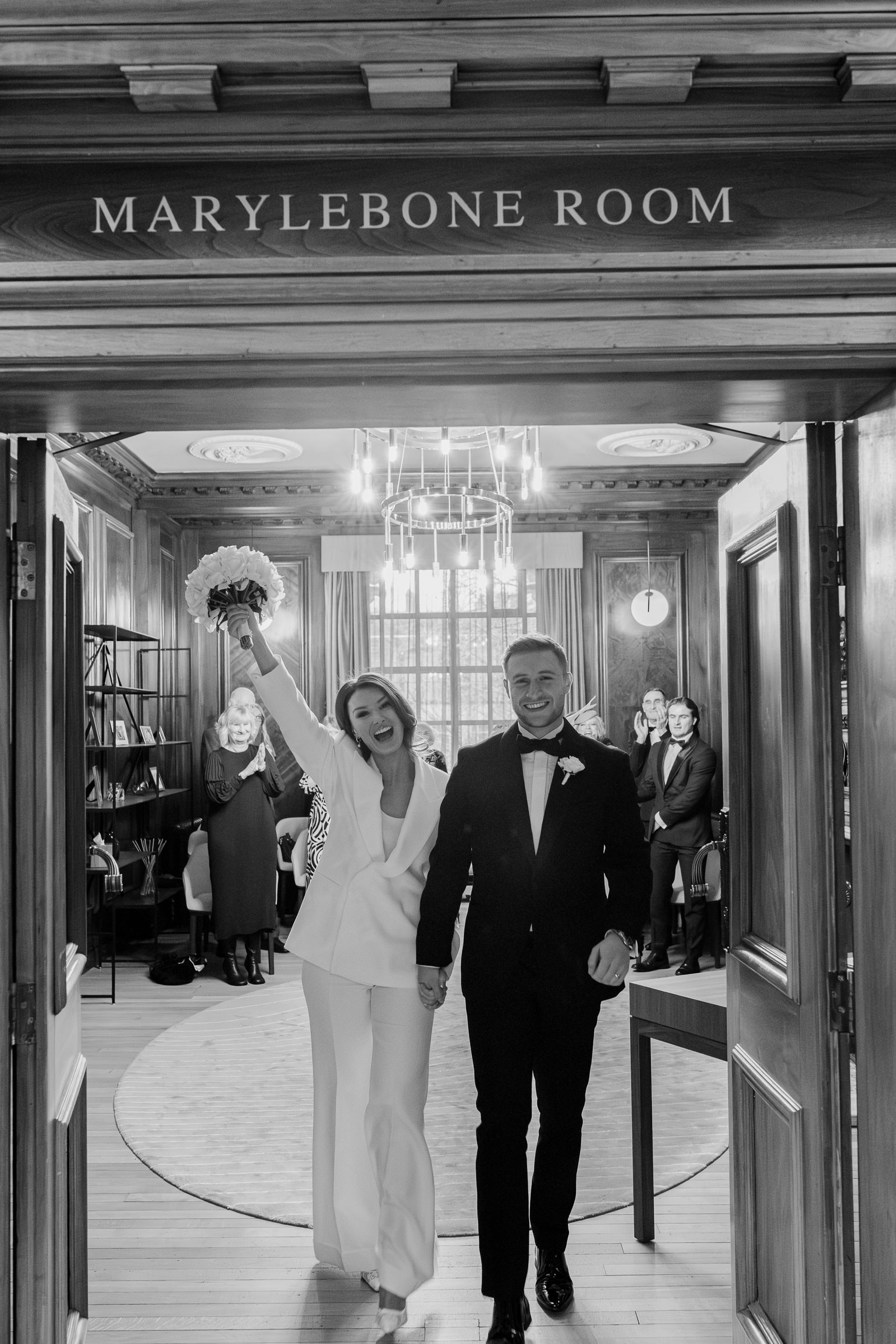 London town hall ceremony in the Marylebone Room with Victoria Beckham bridal suit. london wedding photographer, black-tie editorial London Wedding 