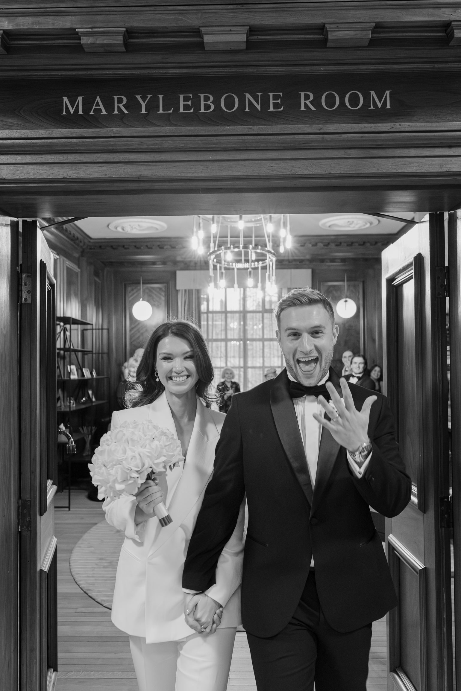 London town hall ceremony in the Marylebone Room with Victoria Beckham bridal suit. london wedding photographer, black-tie editorial London Wedding 