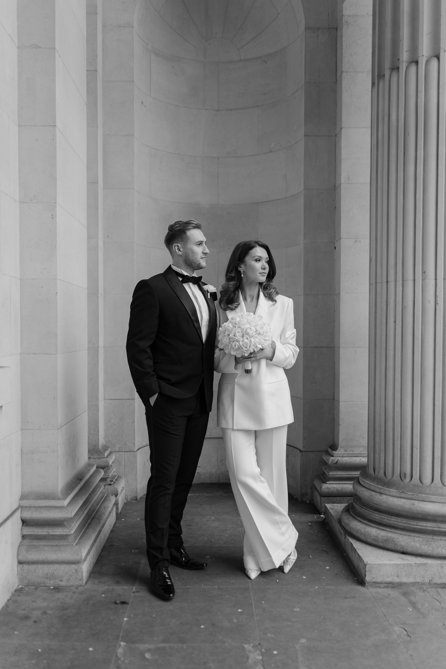 Marylebone Town hall wedding ceremony, with Victoria Beckham bridal suit. london wedding photographer, black-tie editorial London Wedding 