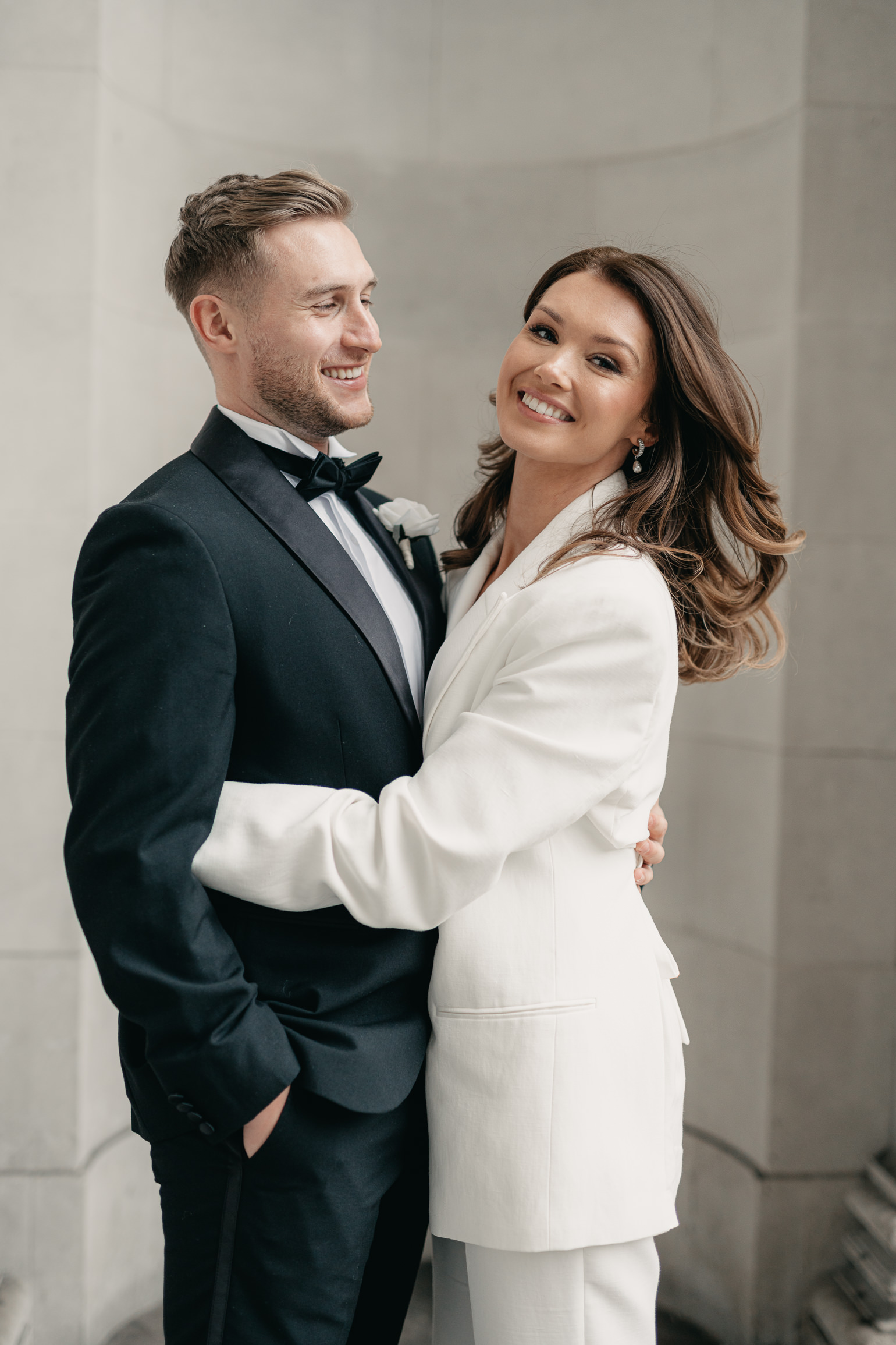 Marylebone Town hall wedding ceremony, with Victoria Beckham bridal suit. london wedding photographer, black-tie editorial London Wedding 