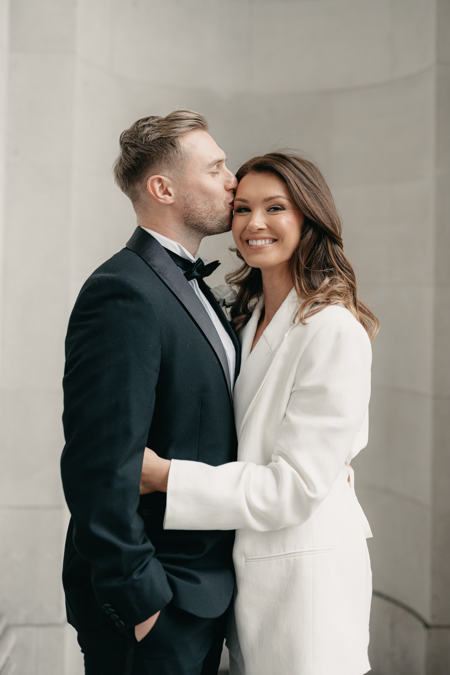 black-tie editoral wedding photos on the steps of Marylebone Town Hall. London wedding photographer, London elopement photographer