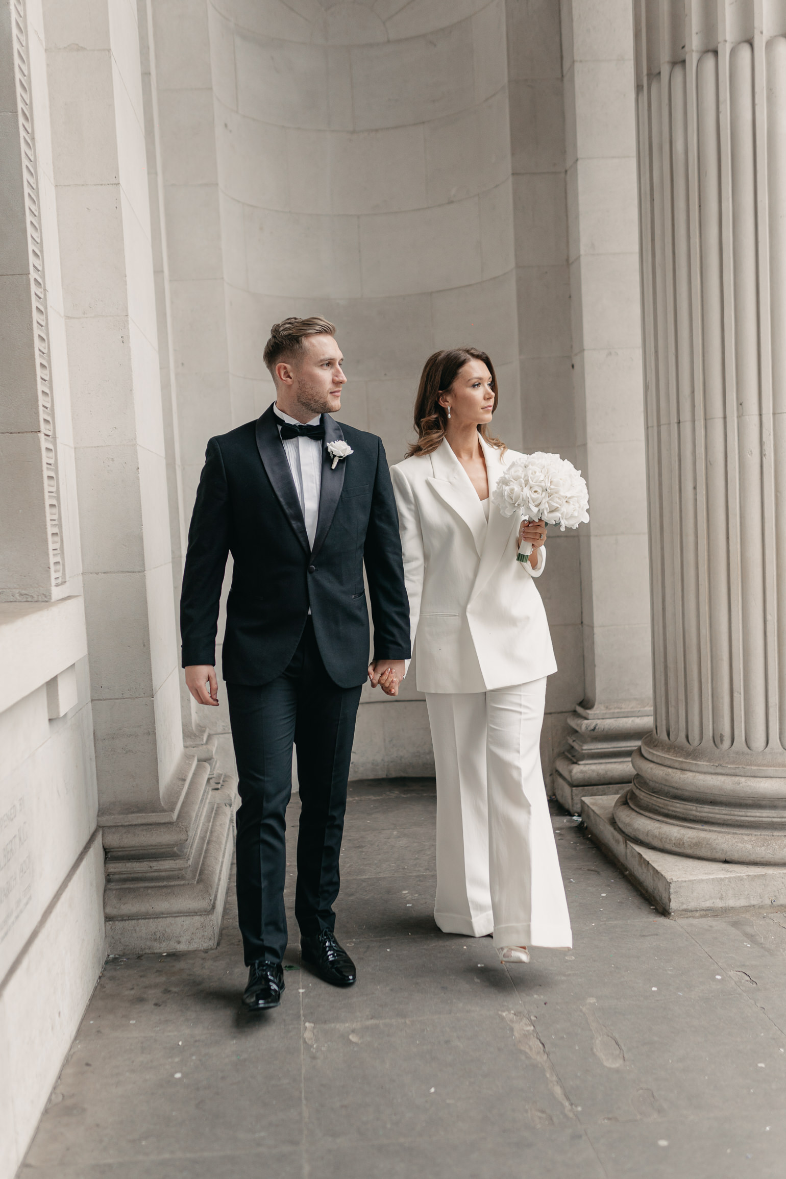 black-tie editoral wedding photos on the steps of Marylebone Town Hall. London wedding photographer, London elopement photographer