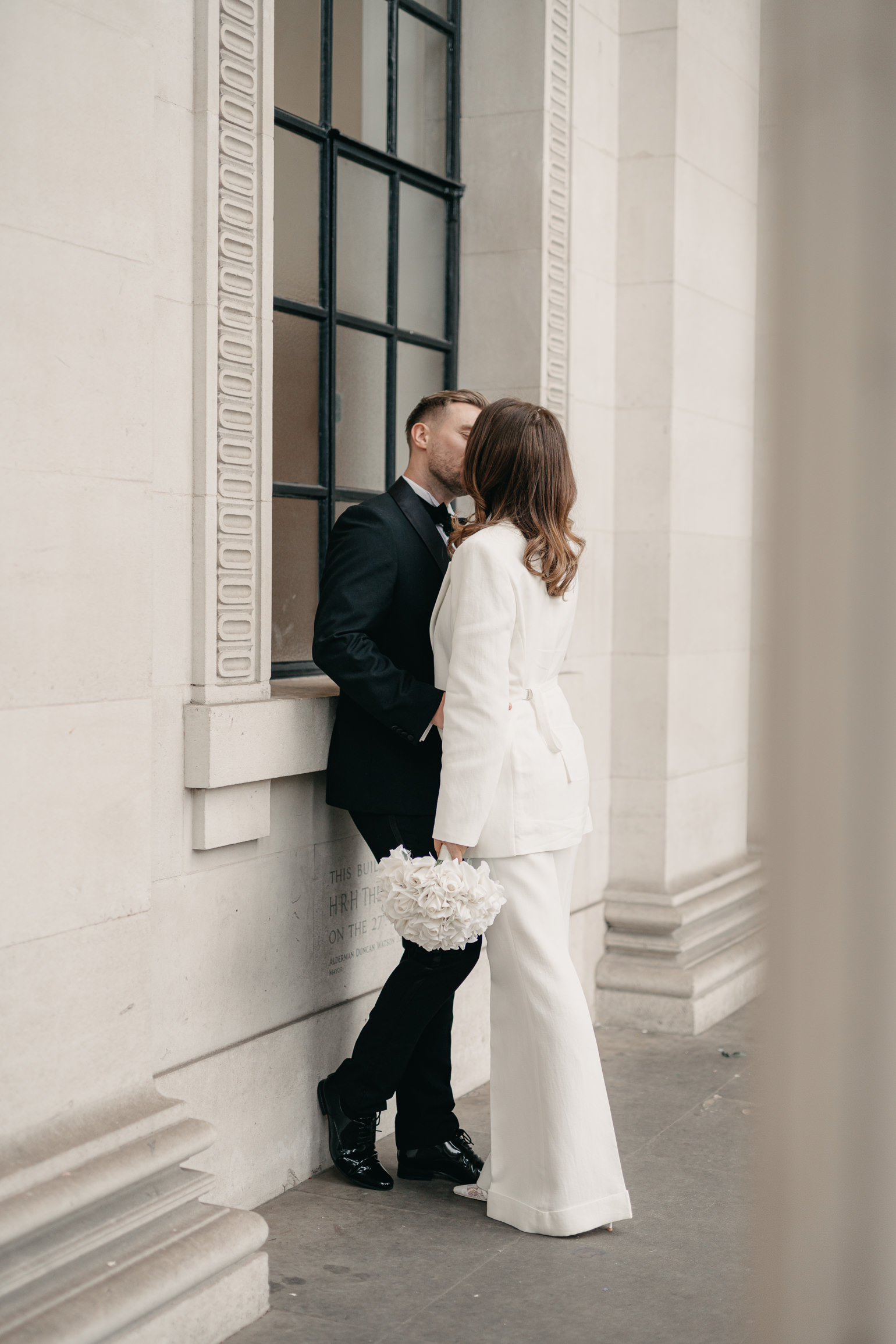 black-tie editoral wedding photos on the steps of Marylebone Town Hall. London wedding photographer, London elopement photographer