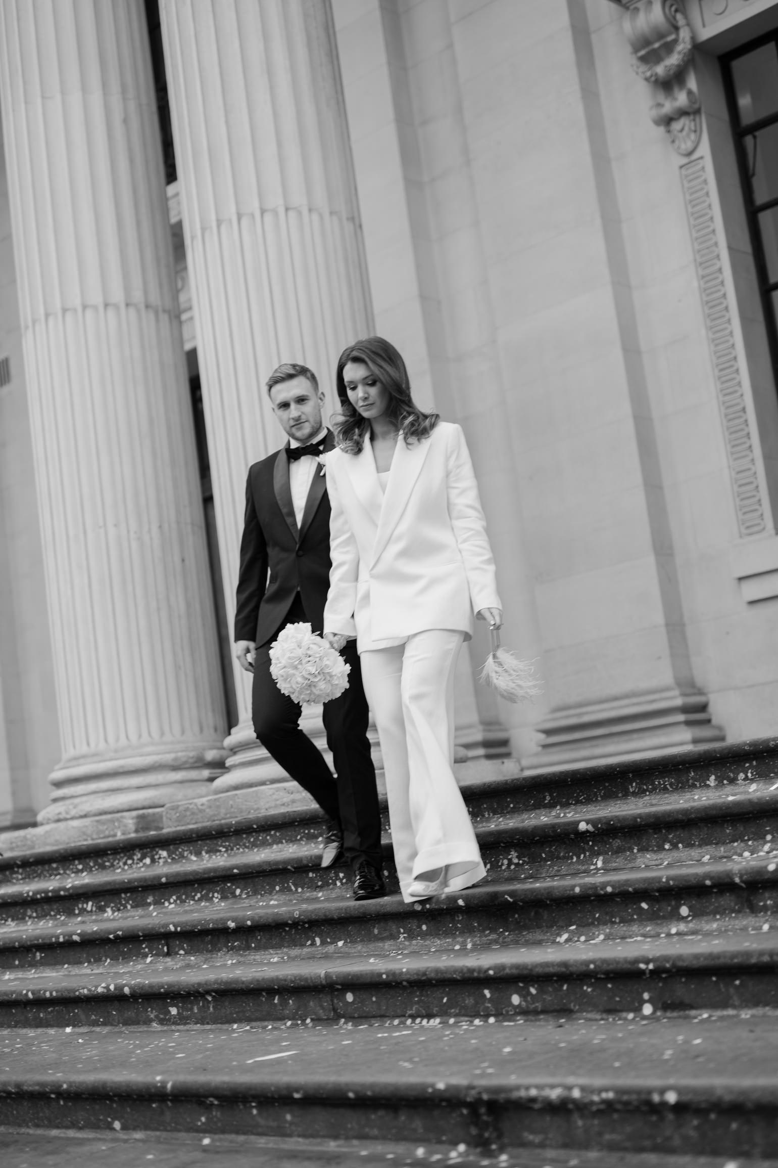 black-tie editoral wedding photos on the steps of Marylebone Town Hall. London wedding photographer, London elopement photographer